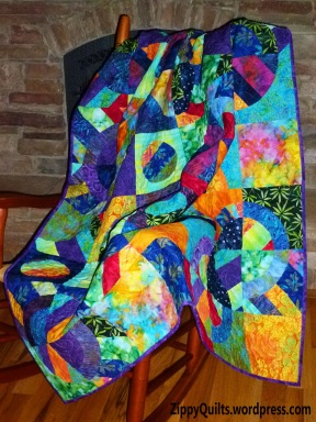 This is made with bright batiks and templates from Elisa's Backporch Design